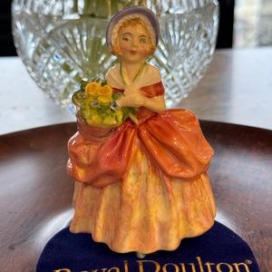 Royal Doulton miniature figurine "Cissie" HN 1809. Young girl with flowers.